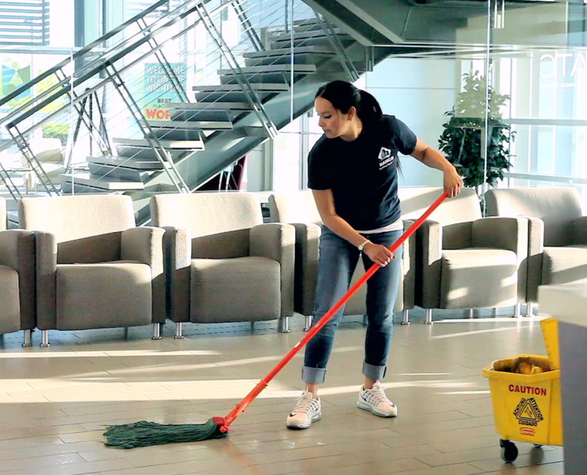Ramco Worker Mopping Floors