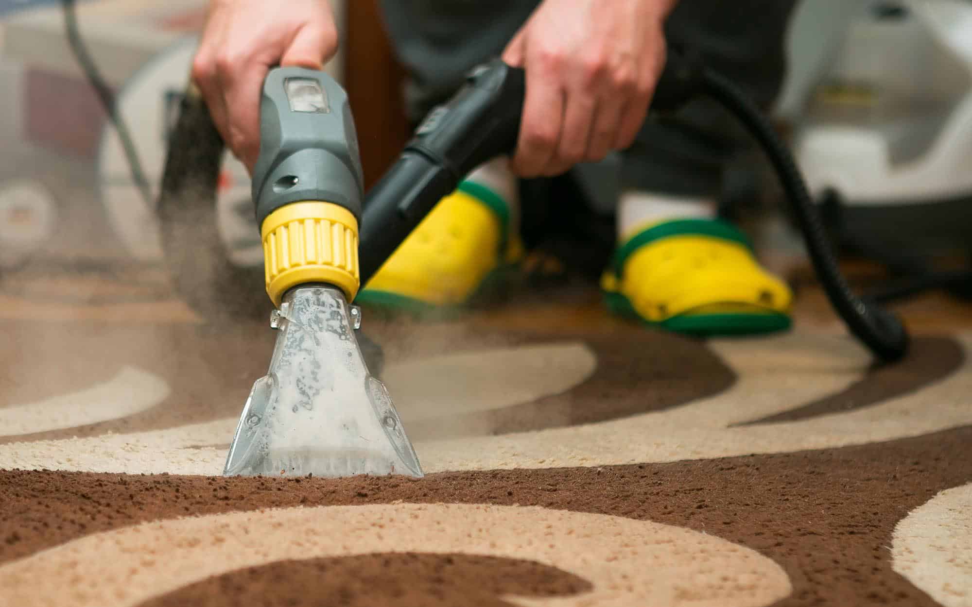 Worker Cleaning Carpet